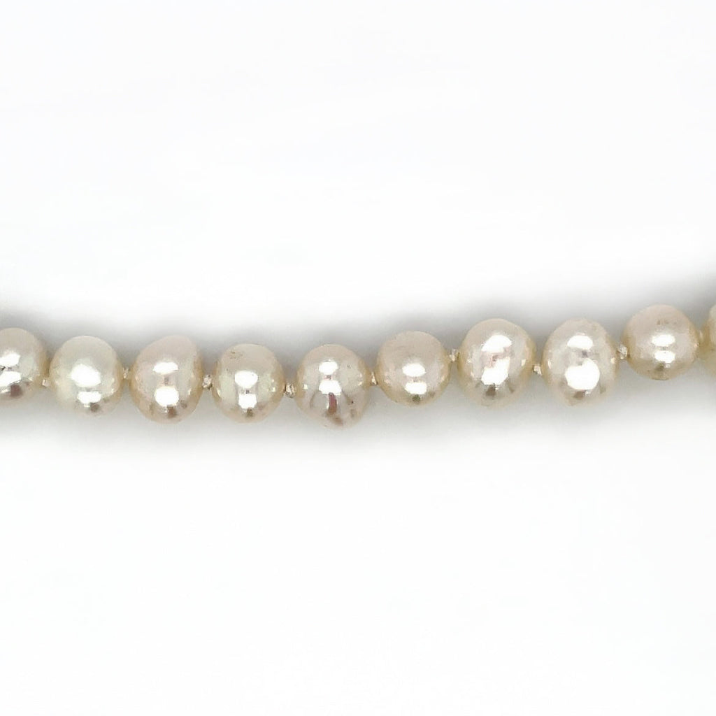 17 inch fresh water 6-6.5mm "potato" pearl necklace on a 9ct yellow gold bow style clasp