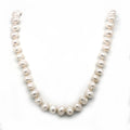 17 inch fresh water 6-6.5mm "potato" pearl necklace on a 9ct yellow gold bow style clasp