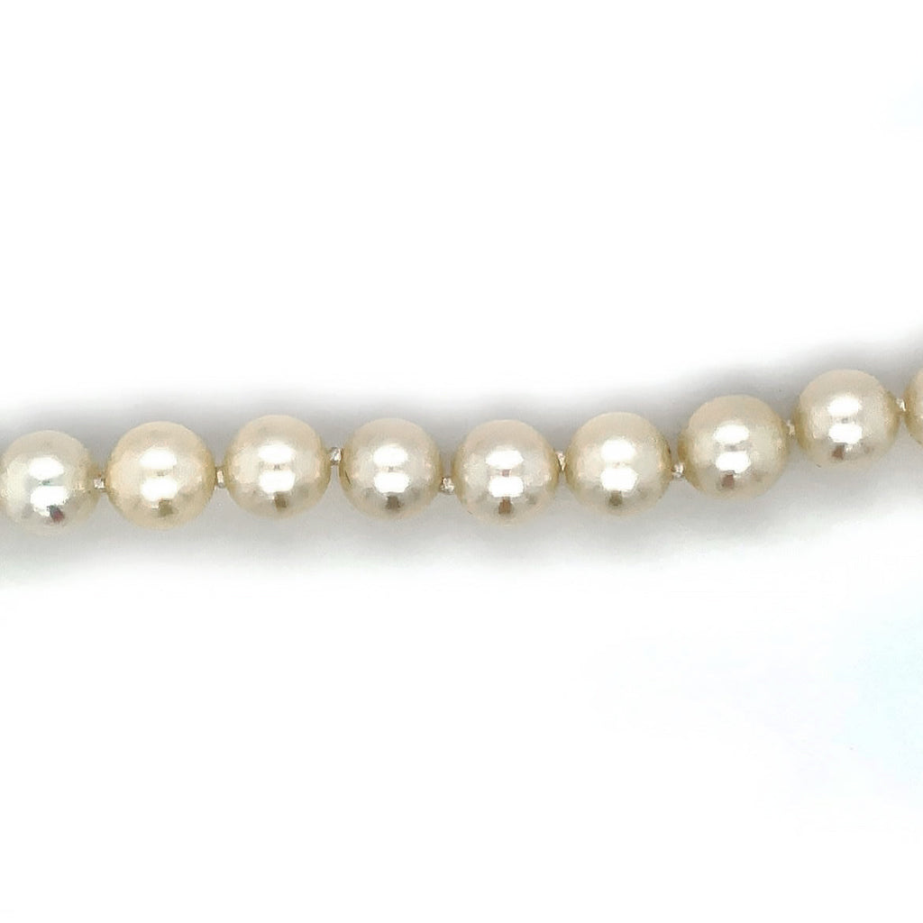 16 inch cultured pearl necklace (6.5mm pearls) on a 9ct yellow gold ball clasp