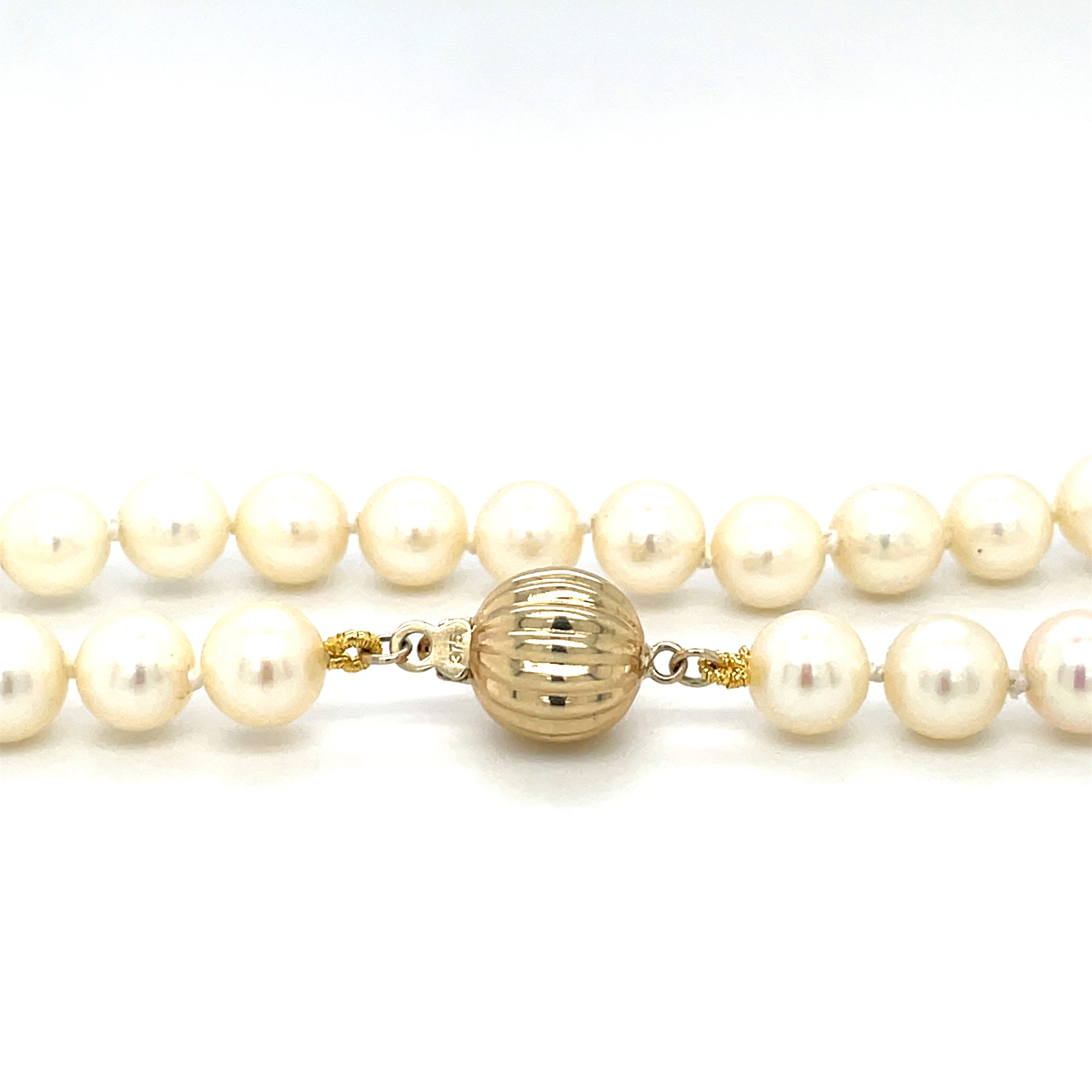 16 inch cultured pearl necklace (6.5mm pearls) on a 9ct yellow gold ball clasp