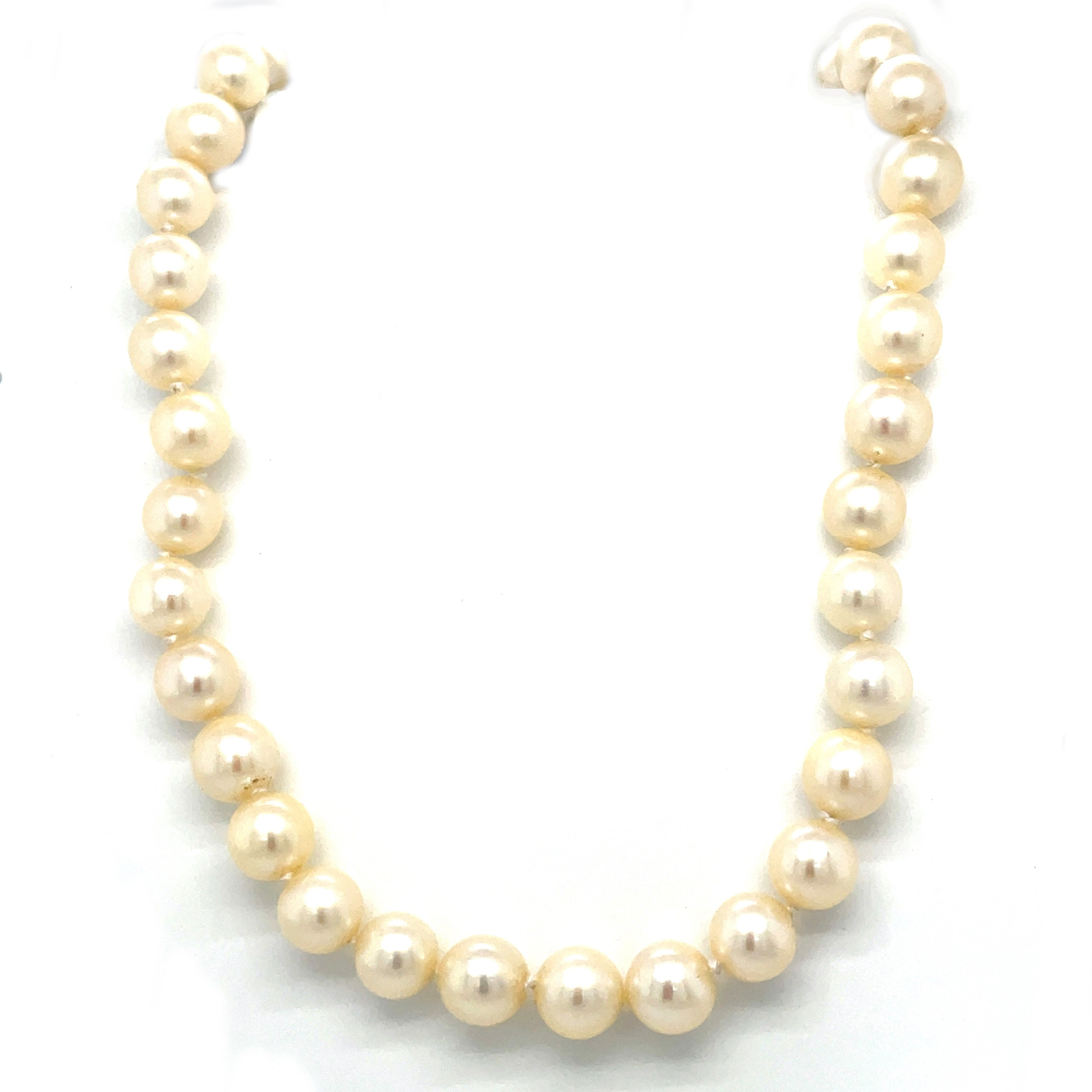 16 inch cultured pearl necklace (6.5mm pearls) on a 9ct yellow gold ball clasp