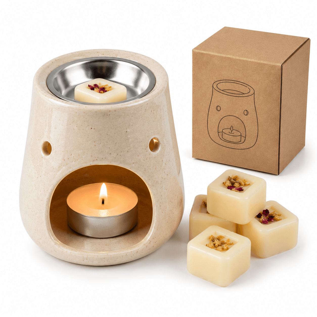 Ceramic wax warmer with a lit candle, wax melts, and packaging on a white background