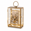 Gold lantern with glass front displaying a photo of flowers, on a white background